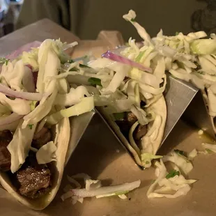 Steak Tacos with a slaw on white corn tortillas