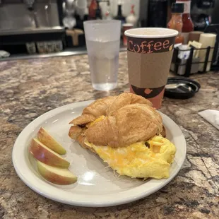 Egg and cheese croissants with sausage and bacon