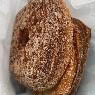 a doughnut covered in sugar