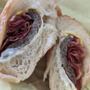 Sausage, bacon and egg on a croissant. Not much egg in the egg sandwich :-/