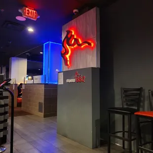 a neon sign in a restaurant