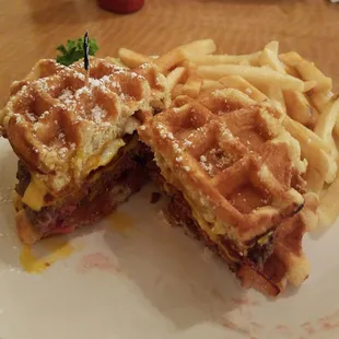 The Brunch Burger- belgian waffles, over easy egg, applewood smoked bacon and a big ol' burger