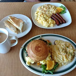 two plates of breakfast food