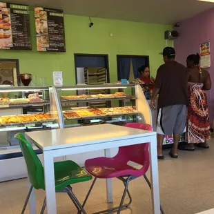 a woman standing in front of the counter