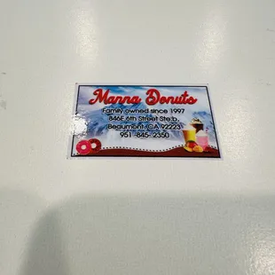 Business label on the box of dozen donuts