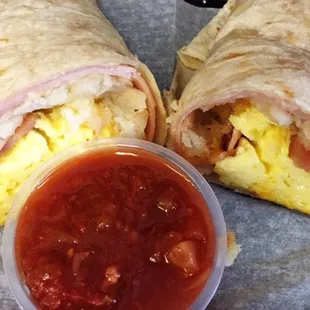 Ham,egg,bacon, cheese, hash brown breakfast burrito.