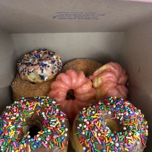8 Doughnuts, 2 Sprinkle, 2 Pink Twists, 2 Crumbs, 2 Glaze
