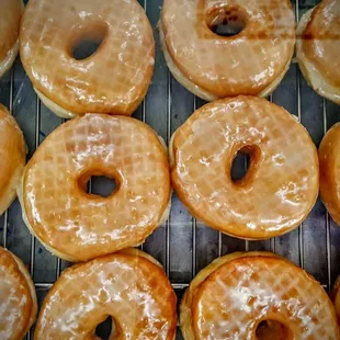 glazed donuts on a cooling rack