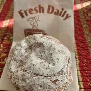 Lemon filled powdered donut