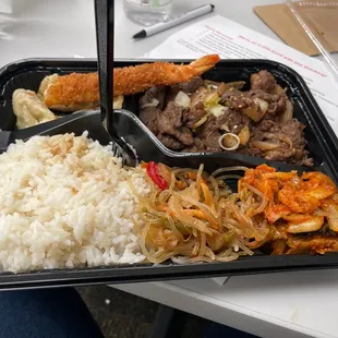 Bulgogi, potstickers,sweet potato noodles, shrimp,and kimchi.