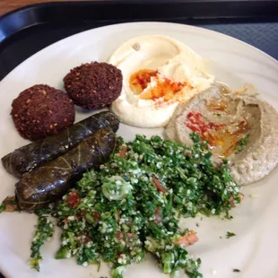 The vegetarian meal!  Falafel, stuffed grape leaves, hummus, Baba Ghanoush, and tabbouleh.  Served with fresh, warm pita bread.