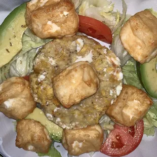 a salad in a styrofoam container