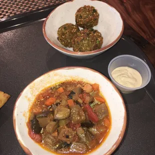 Side of falafel, chick pea stew