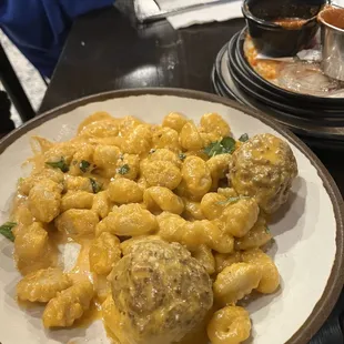 Gnocchi with vodka sauce and meatballs