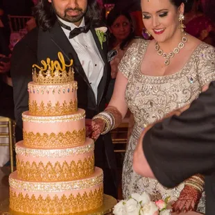 My beautiful wedding cake from manninos. Using gold ribbon and rhinestone trim I gave them