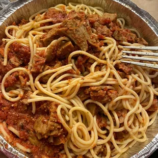 It&apos;s funny it&apos;s asking Me &quot;what&apos;s in this photo?&quot; because I barely know myself and I ordered it. &quot;Spaghetti with meat sauce&quot;