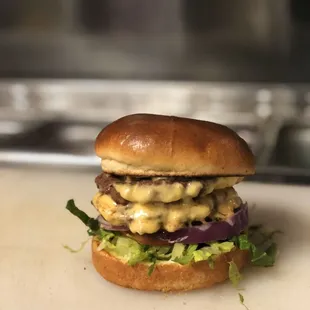 Double cheeseburger on brioche bun cooked to perfection !