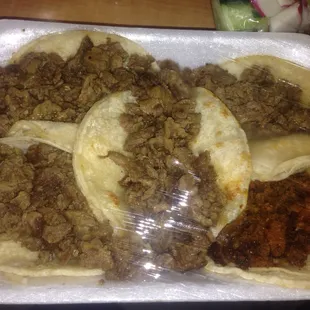 4 carne asada tacos and 1 chorizo