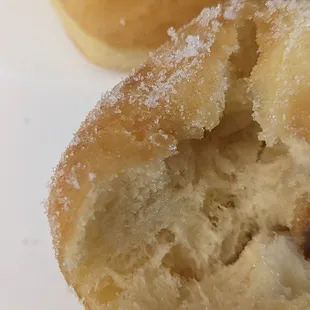 inside of the malasada ... looked to be fluffy, but a disappointment.  7.5.22