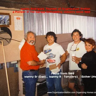 a group of people standing in a room