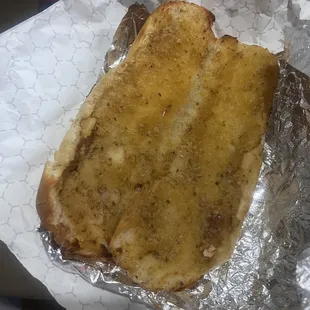 a sandwich wrapped in foil