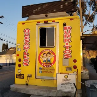 a yellow food truck