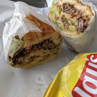 Bistek (steak) torta.   The beef is shredded, dry, and flavorless.   (This is the style in Minneapolis for some reason, not just here.)
