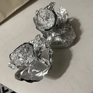 a pile of aluminum foil wrapped in aluminum foil
