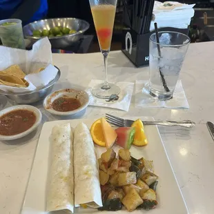 Breakfast burritos with a peach mimosa