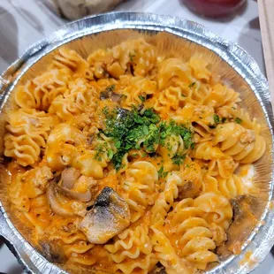 Radiatore with al formaggio and tomato basil, mushrooms and sausage