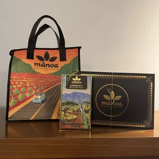 Manoa Chocolate insulated bag, chocolate bar and gift box.
