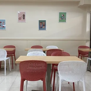 a restaurant with tables and chairs