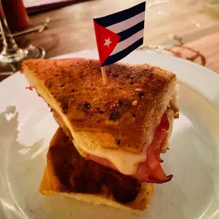 Cuban sandwich (Cuban bread with mojo pork, ham, Swiss, house made pickles, Mayo, mustard)