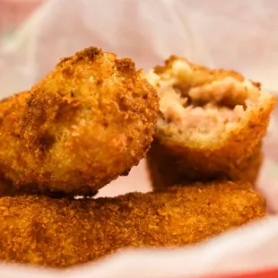 fried chicken nuggies in a basket