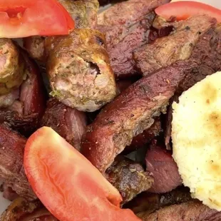 a plate of meat and vegetables