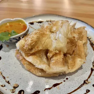 The flakiest Roti. It&apos;s so good!
