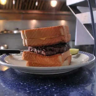 We're known for having awesome Gourmet Burgers! This one: the Grilled Cheese Burger