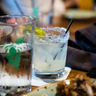 a glass of water and a plate of food