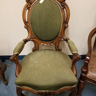 Nice old chair with green fabric