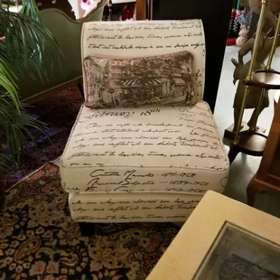 Second half to the pair of chairs with writing on them