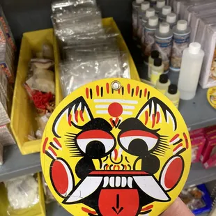a person holding a sticker