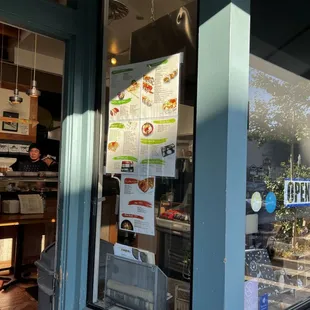 Menu on the window as you enter; menu also available inside.