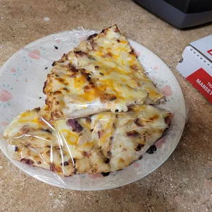 two slices of pizza on a plate