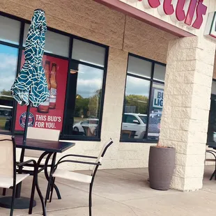 If you are looking for outdoor dining, we do offer a couple of tables out front.