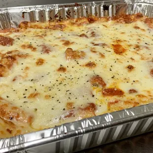 1/2 pan of rigatoni with Italian meat sauce.