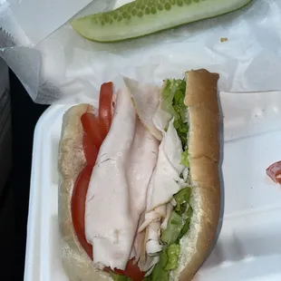 Turkey lettuce tomato and mayo this place never disappoints there for and homemade pickles are a pregnant girls dream