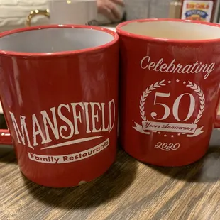 two red mugs