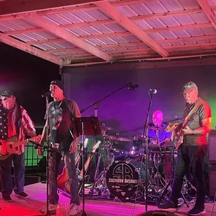 a band performing on stage