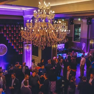 a crowd of people at a party