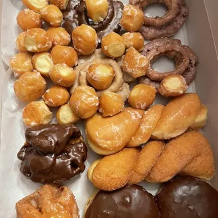 a variety of donuts in a box